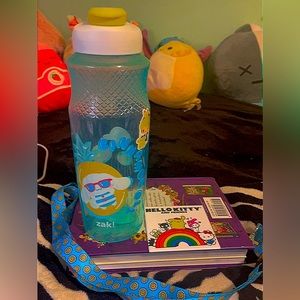 Sanrio water bottle, magnet and blue daisy lanyard
